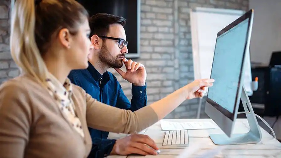 One-to-one SEO training at a computer