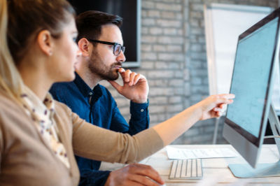 Man and a Lady Sitting in Private SEO Training Course